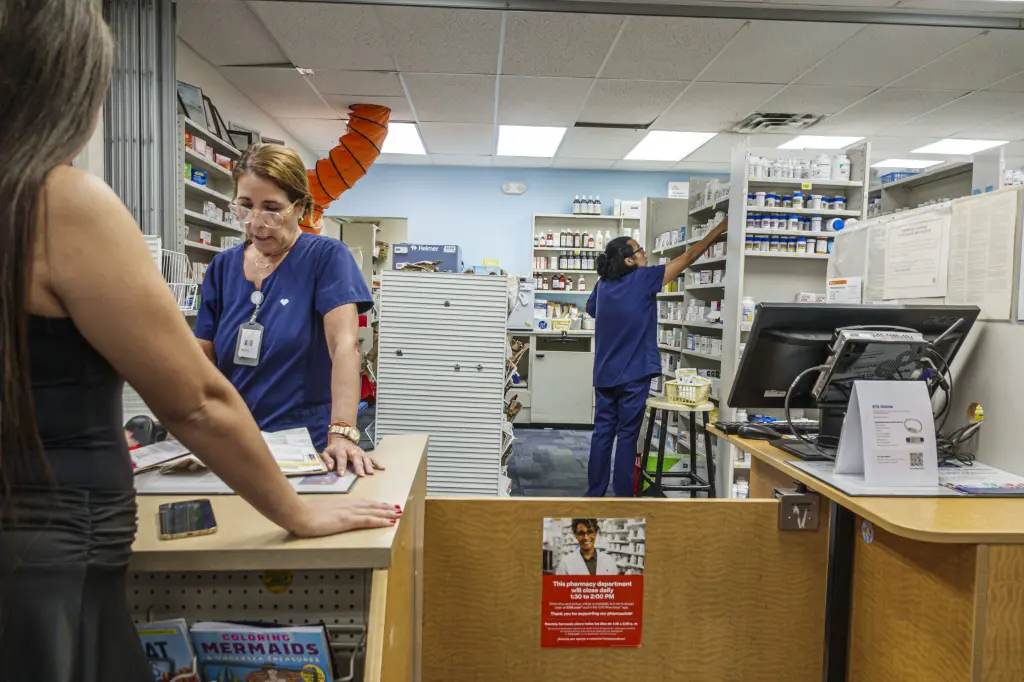 Pharmacy staff filling prescriptions