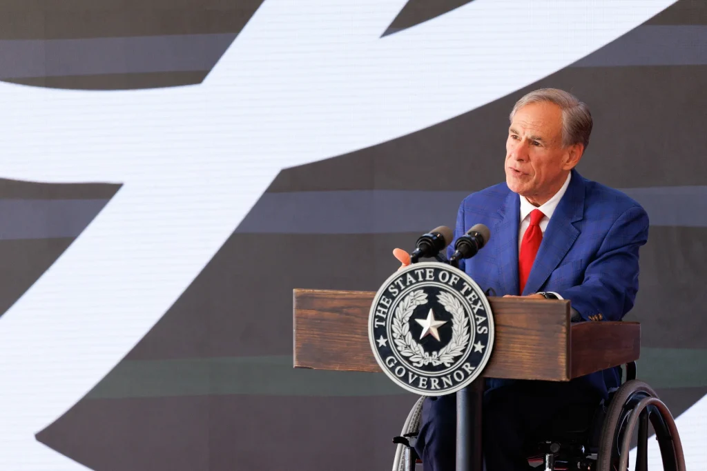 Texas Welcomed the Data Center Boom. Now Its Governor Says They ‘Dug Their Own Grave.’ Texas Governor Greg Abbott speaking at a podium bearing the state seal